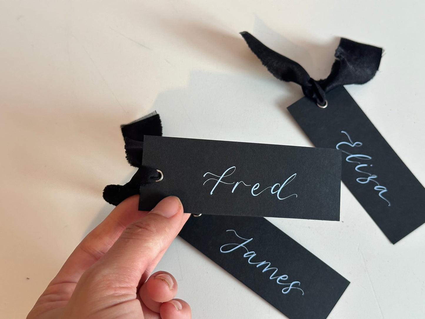 BLACK Ribbon Calligraphy Place Name Card | White Calligraphy Wedding Place Name Card | Gold or Silver Eyelet Place Card