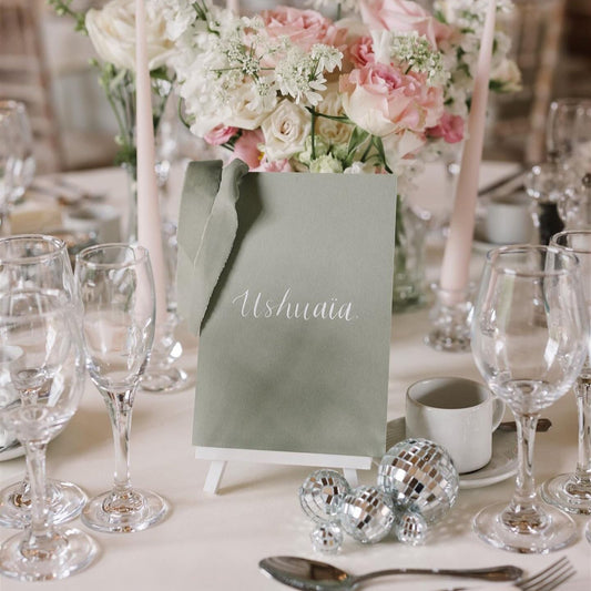 green table name with calligraphy personalised