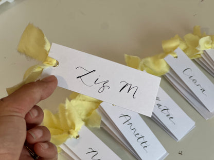 BUTTER Ribbon Calligraphy Place Name Card | White Calligraphy Wedding Place Name Card | Gold or Silver Eyelet