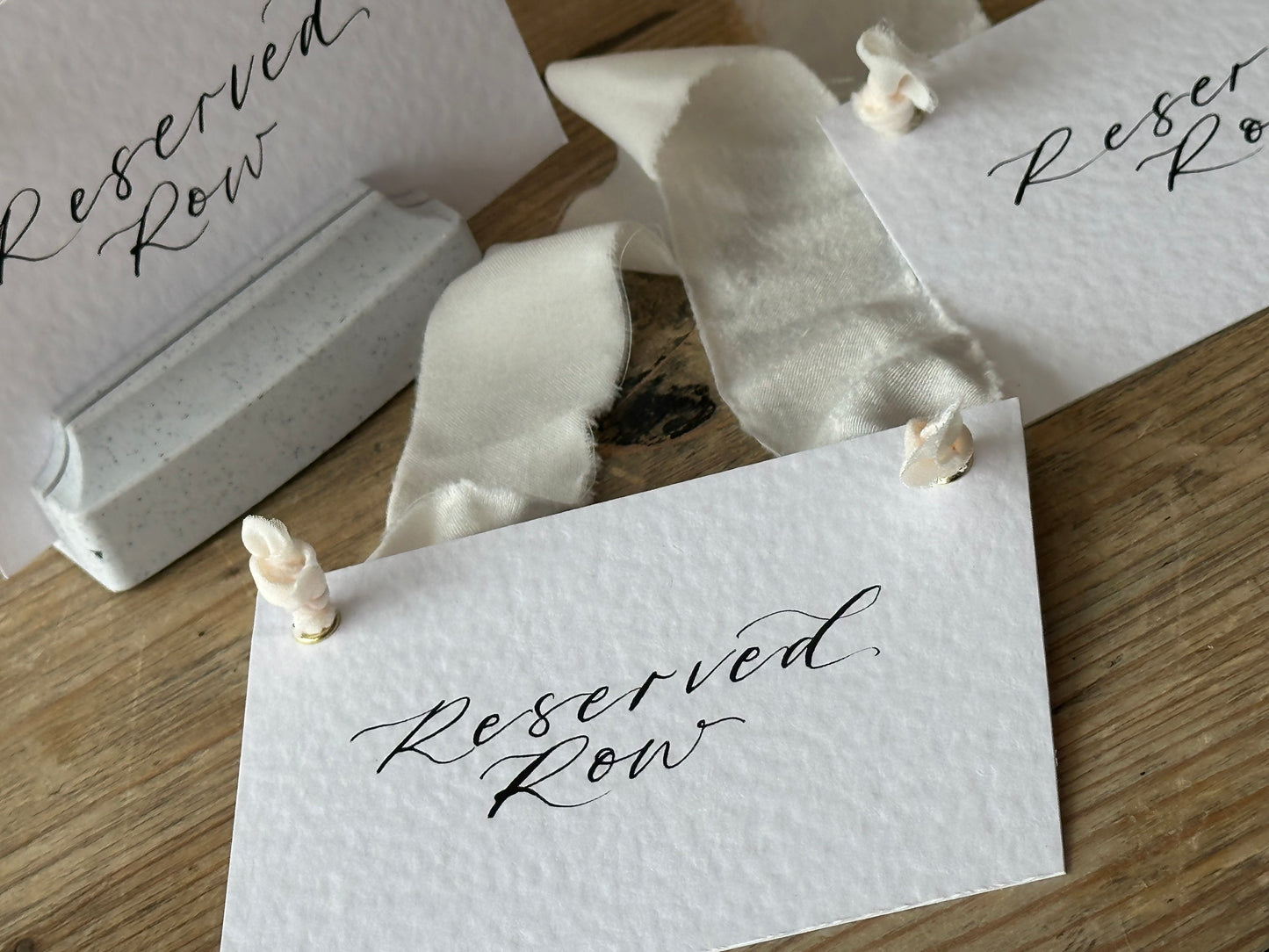 Custom Ribbon Calligraphy Wedding Reserved Chair Sign | A7 Hammered White Reserved Sign with Your Choice of Ribbon