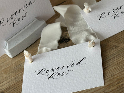 Custom Ribbon Calligraphy Wedding Reserved Chair Sign | A7 Hammered White Reserved Sign with Your Choice of Ribbon