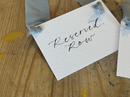 Custom Ribbon Calligraphy Wedding Reserved Chair Sign | A7 Hammered White Reserved Sign with Your Choice of Ribbon