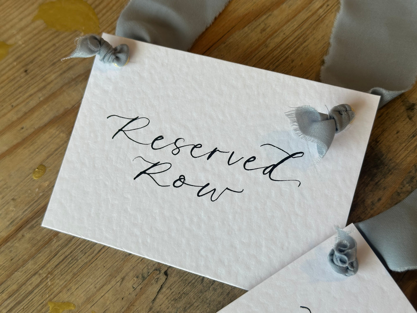 Custom Ribbon Calligraphy Wedding Reserved Chair Sign | A7 Hammered White Reserved Sign with Your Choice of Ribbon