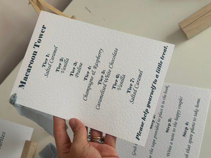 Personalised printed wedding sign on A5 hammered white card with dusky blue chiffon ribbon and silver eyelet