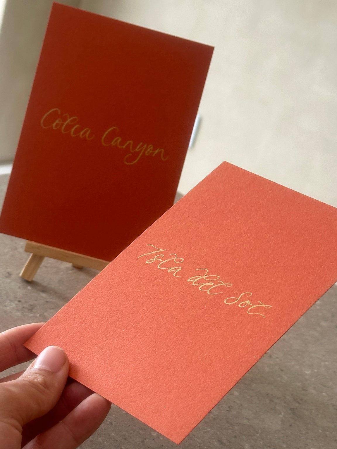 Colourful orange handwritten calligraphy table sign without ribbon