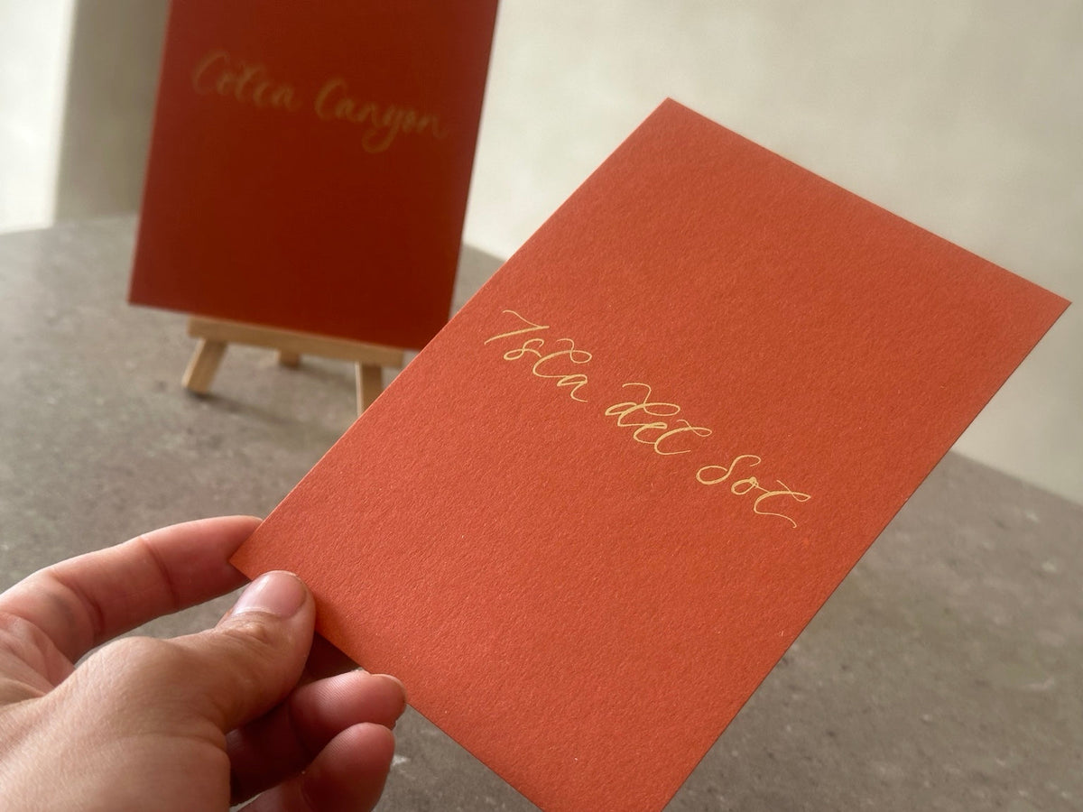 Colourful orange handwritten calligraphy table sign without ribbon