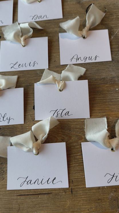 CHAMPAGNE White Square *ish Chiffon Ribbon Calligraphy Place Name Card | White Calligraphy Wedding Place Name Card | Gold or Silver Eyelet
