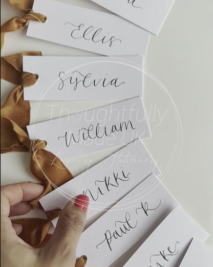 OCHRE Chiffon Ribbon Calligraphy Place Name Card | White Calligraphy Wedding Place Name Card | Gold or Silver Eyelet