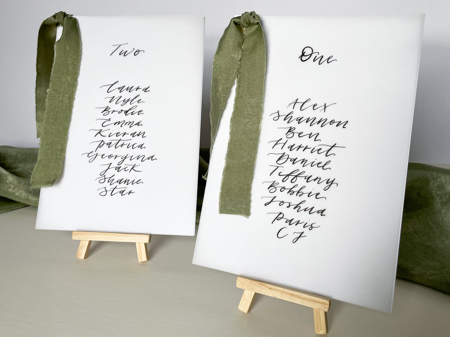 vellum Table plan card with chiffon ribbon , modern calligraphy, calligraphy table plan, vellum table plan, handwritten table plan card, modern table plan, traditional table plan, modern wedding decor, chiffon table plan, ribbon table plan, eucalyptus, sage, green, forest green, 