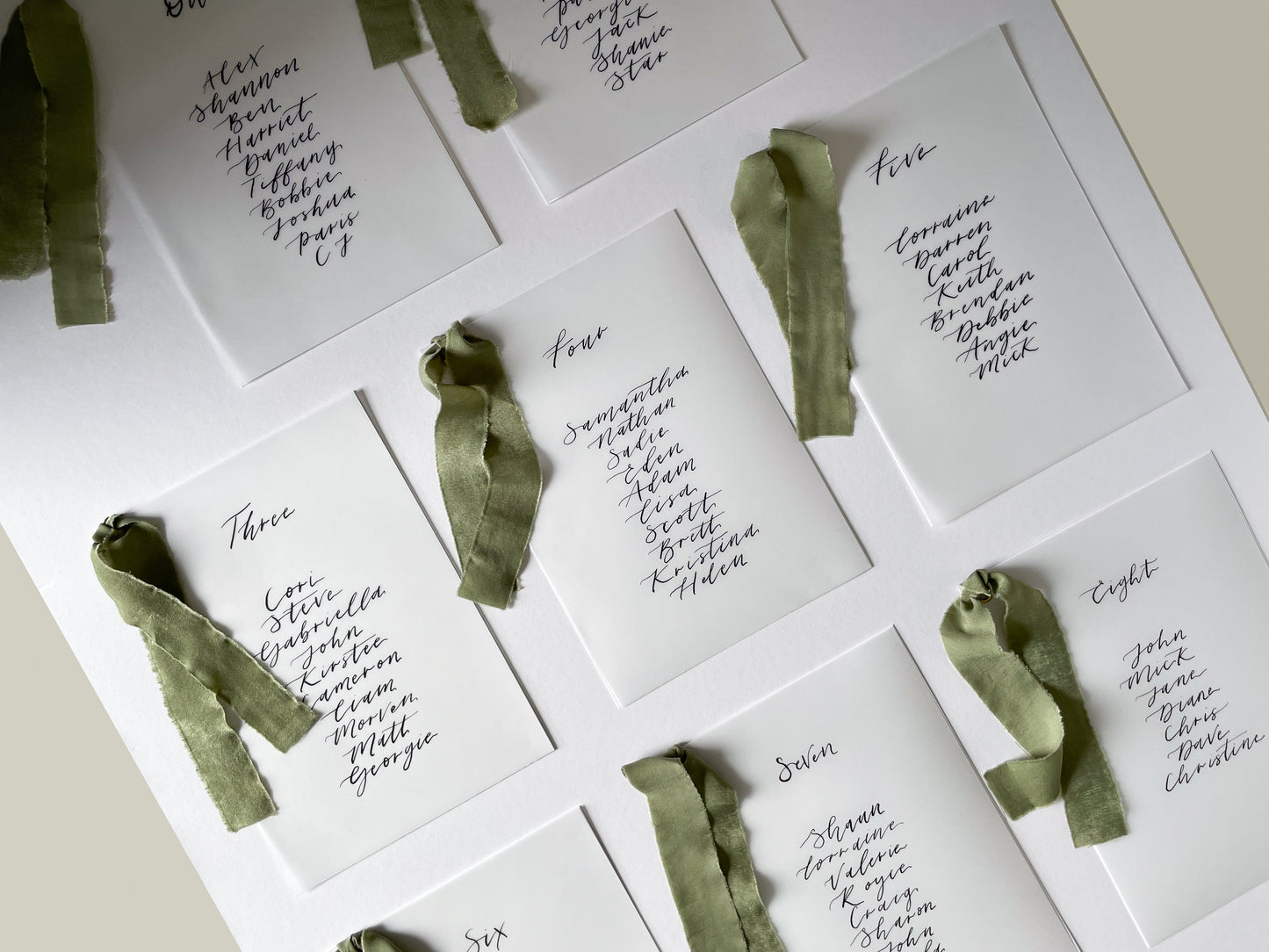 vellum Table plan card with chiffon ribbon , modern calligraphy, calligraphy table plan, vellum table plan, handwritten table plan card, modern table plan, traditional table plan, modern wedding decor, chiffon table plan, ribbon table plan, eucalyptus, sage, green, forest green, 