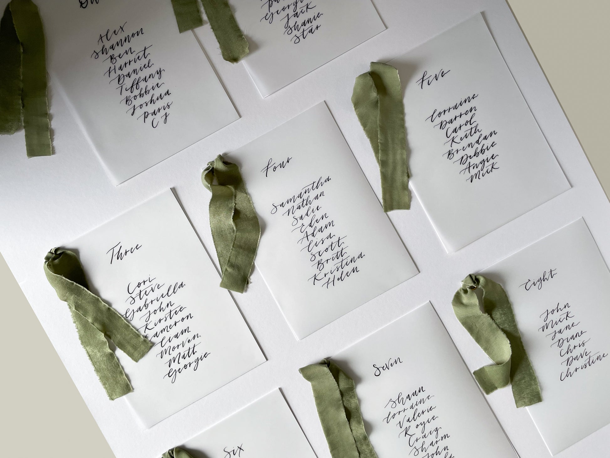 vellum Table plan card with chiffon ribbon , modern calligraphy, calligraphy table plan, vellum table plan, handwritten table plan card, modern table plan, traditional table plan, modern wedding decor, chiffon table plan, ribbon table plan, eucalyptus, sage, green, forest green, 