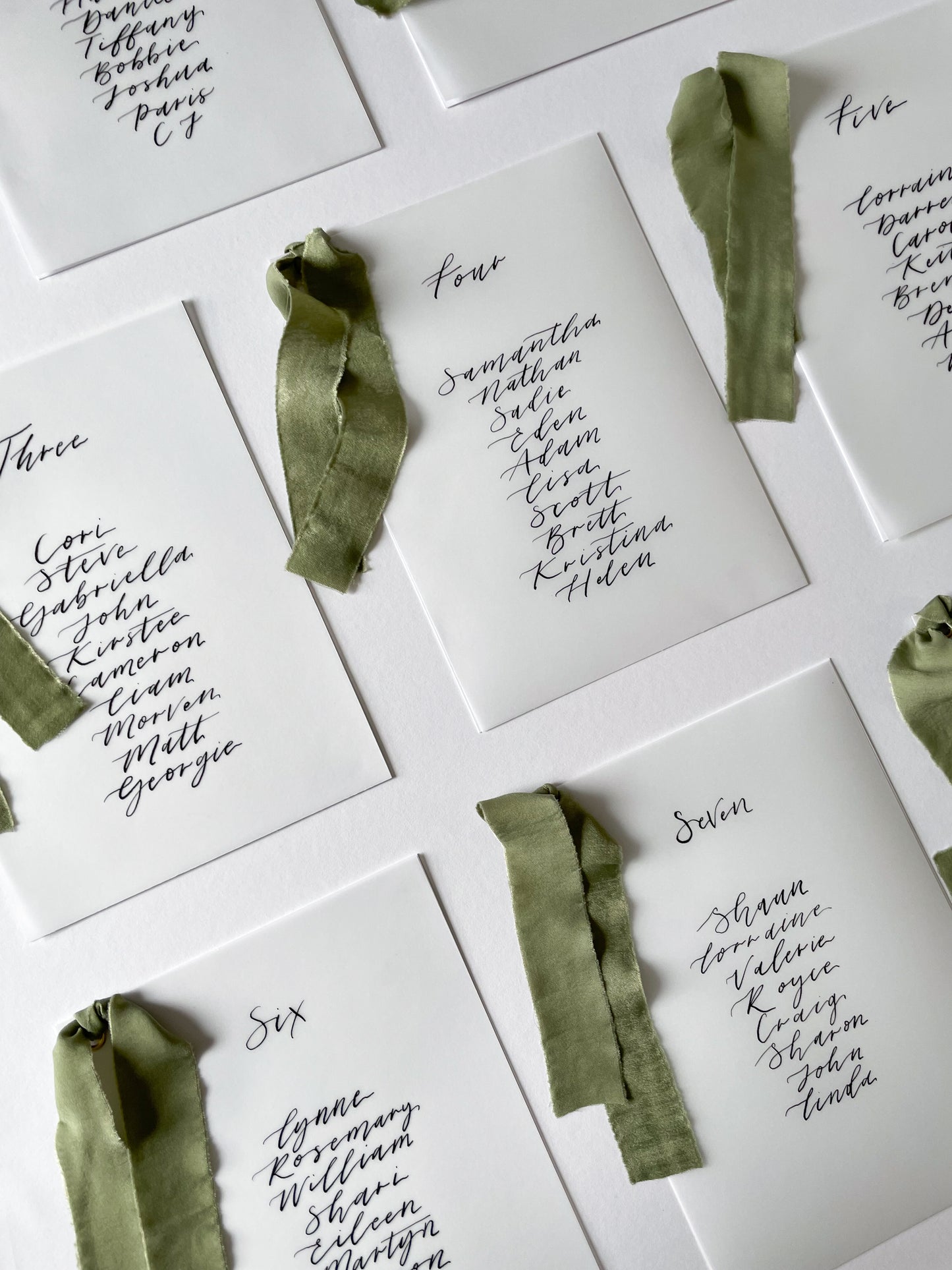 vellum Table plan card with chiffon ribbon , modern calligraphy, calligraphy table plan, vellum table plan, handwritten table plan card, modern table plan, traditional table plan, modern wedding decor, chiffon table plan, ribbon table plan, eucalyptus, sage, green, forest green, 