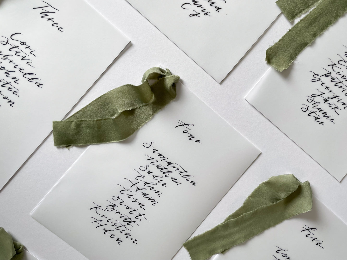 vellum Table plan card with chiffon ribbon , modern calligraphy, calligraphy table plan, vellum table plan, handwritten table plan card, modern table plan, traditional table plan, modern wedding decor, chiffon table plan, ribbon table plan, eucalyptus, sage, green, forest green, 
